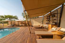 Swimming Pool At Singita Sabora Tented Camp In 2021 Tent Camping Luxury Safari Lodge Luxury Tents