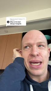 Bald Dude Brushing Invisible Hair