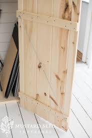 Straightening The Studio Closet Doors Miss Mustard Seed Closet Doors Diy Cabinet Doors House And Home Magazine