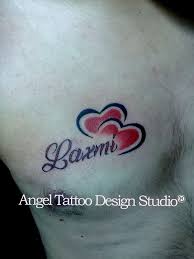 Laxmi Name Tattoo With Red Colour Hearts Made On Chest At Angel Tattoo Design Studio Gurgaon Angel Tattoo Designs Tattoo Shop Alien Tattoo