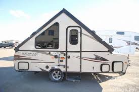 Both trailers feature a fiberglass, vacuum bonded exterior. 2018 Forest River Rockwood Hard Side Pop Up Campers A122s