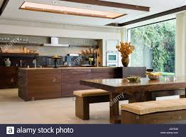 wooden dining table and benches by
