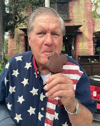 I just ate my first chocolate covered banana! Here are some of the pictures  @minnie_magic_mom 😂 My grandpa is here at Disney World for my birthday and  we have been having a