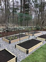 This is a detailed video about setting up or build up a trellis netting system to support plants in tunnel farming. Titan Tunnel Trellis For Squash Zucchini Melons Backyard Vegetable Gardens Vegetable Garden Design Garden Layout