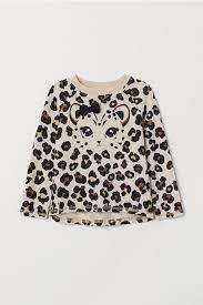 We dig how she fills up a sofa or accent chair, too. Leopard Print Top Light Beige Leopard Print Kids H M Gb Leopard Print Top Girl Outfits Fashion