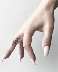 By Jojo Flower Finger Tattoos Finger Tattoo For Women Tattoos