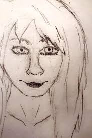 My first and second attempt at drawing a face.