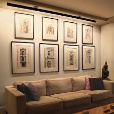 Include your furniture arrangement and any features you want to accent, such as artwork or accolades. How To Arrange Perfect Lighting For Your Artwork Widewalls