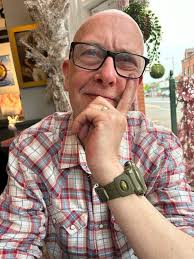 The death has occurred of John McStravick (Belfast)