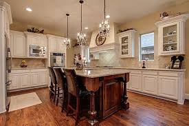 Use Of Mini Chandeliers As Pendant Lights For Kitchen Over Island Rustic Light Fixtures Diy Kitchen Island Kitchen Pendant Lighting