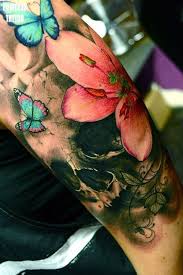Butterfly With Flower Tattoo 50 Butterfly Tattoos With Flowers For Women Tatuajes De Flores Craneos Tattoo Tatuaje De Princesa