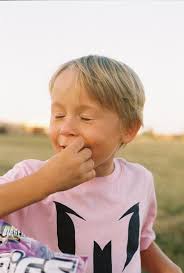 What causes red flares and blue lines in 35mm film camera photos?