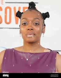 Jasmine Swift arrives at the Disney+ Original Series' THE CROSSOVER  Premiere held at the Hollywood Athletic Club in Los Angeles, CA