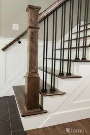 The collection of scotia stairs limited metal balusters (aka iron spindles) add impressive value to your home staircase. Staircase With White Accents And Black Metal Spindles And Shoes Stair Railing Design Entryway Stairs Iron Stair Railing