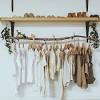 If space is limited and you like simple designs with a bit of industrial flair, check out ship, a minimalist clothing rack and organizer handcrafted with an iron frame and a wooden. 3