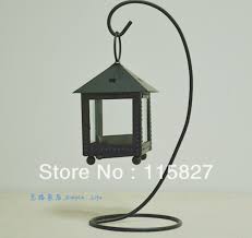 20 h x 5 1/2 square base with wood finial 3 way switch 6w. Black Metal Lantern Iron Candle Holder Classical Style Candlestick Holder With Hanger House Decoration Wedding Decor Candle Holders Iron Candle Holdercandlestick Holders Aliexpress