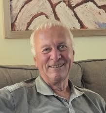 What are the differences in the two photos of the family?