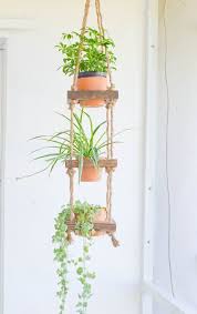 Go for a nordic look and hang these planters inside your home too. Rustic Hanging Planter 3 Tier Hanging Planter By Archerhomedesigns Hanging Plants Diy Plant Stand Hanging Plants Diy