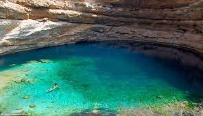 The World S Most Stunning Sinkhole Cavernous Limestone Bowl Is So Beautiful It S Become A Tourist Attraction Natural Pool Swimming Holes Pool
