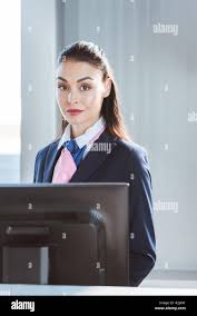 Woman standing airport check in desk hi-res stock photography and images -  Alamy