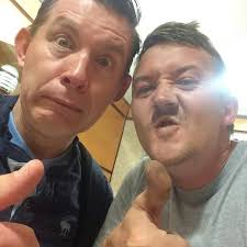 Can of Coke and a pie with sauce