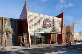 Re Architecture Une Veture Bois Pour Rehabiliter Le Centre Commercial Auchan Perpignan Archigroup
