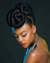 Straightened natural hair is either flipped up or layered alongside wings that also flip back, akin to hairstyles popularized during the 1980s. Updos For Black Hair Best Updo Hairstyles For Black Women December 2020