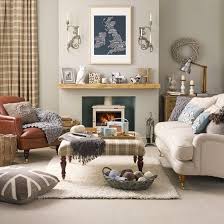 These rooms are packed with inspiration on how to make a living room cozy, from layering textiles to adding a large gallery wall of family heirlooms. Relaxed Country Living Room Living Room Designs Fabrics Ideal Home Cosy Living Room Country Living Room Design Beige Living Rooms
