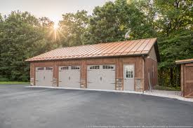Metal roofing use thin gauged metal which is light in weight (nearly half the weight of asphalt metals reflect sunlight which keeps a house cool in places where summers are especially severe. Building Showcase Garage With Copper Penny Metal Roof A B Martin Roofing Supply