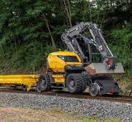 A compact excavator for railway construction and maintenance