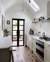 Being simple is a powerful key to a small space like galley kitchen. 11 Beautiful Galley Kitchen Design Ideas Fifi Mcgee Interior Blogger Uk Galley Kitchen Design Galley Kitchen Layout Galley Kitchen Remodel