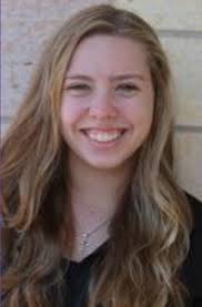 Freshman breaks 25-year-old school swim record