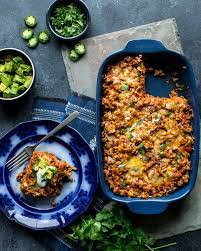 This layered chicken enchilada casserole is ready in just 35 minutes, a snap to make, super yummy and kid friendly. Layered Chicken Enchilada Casserole Healthy Seasonal Recipes