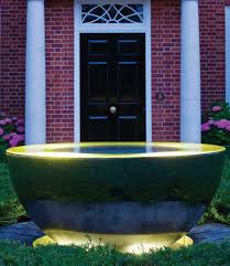 sky chalice stainless steel water feature lit up at dusk water features water features in the garden water