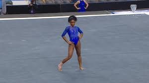 It was tricky to tell the bears from the bruins, since both teams wore deep blue uniforms with gold trim; Gymnastics Ucla