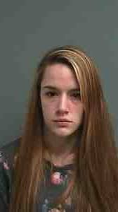 Police: Woman acccused of cashing stolen checks.