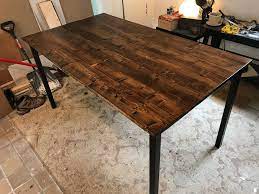 So as not to waste any parts, we switched out the tabletop from the ikea table with this table, so we had a bit of a larger table in that breakfast nook space (and with lower legs added it would make a great kid's art/play table too. Ikea Patio Table Wood Top Dave Eddy