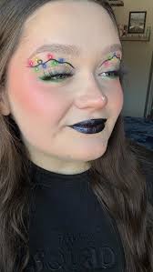 maybe next year i'll have some christmas light earrings to go with this 🔥,  products used:, BROWS, @anastasiabeverlyhills brow freeze gel,  @urbandecaycosmetics brow blade shade "dark drapes", FACE, ...
