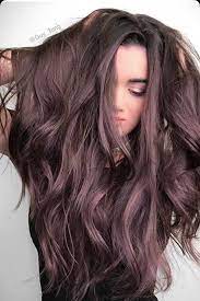 Purple hair color looks elegant, chic, and unusual. Brown Amethyst Dark Chocolate Brown Hair With A Lilac Purple Undertone Dark Chocolate Brown Hair Hair Styles Trendy Hair Color