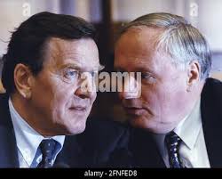 Gerhard Schröder (r.), Prime Minister of the Saarland, and Rudolf Scharping  (l.), Member of the Bundestag, in conversation. [automated translation]  Stock Photo