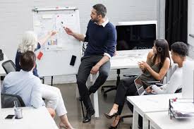 Creative People Sitting At Table In Boardroom Online Marketing Courses Marketing Courses Incentives For Employees