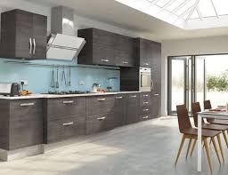 Stainless steel cabinets don't always mean gray. Mad About Grey Kitchens Grey Kitchens Grey Kitchen Cabinets Grey Kitchen Walls