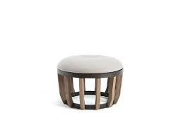 A pouf with a tray on top makes a great end table for a chair or sofa. Pouf And Coffee Table Ethimo