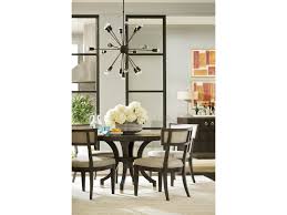 Curved, classic chairs and a sparkling chandelier contribute to the refined look of the room, but the bleached wood frames and raw linen upholstery of the chairs smartly. Universal Soliloquy Casual Dining Room Group Reeds Furniture Casual Dining Room Groups
