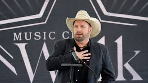 Garth Brooks pens emotional message as he returns to the stage hours after denying sexual assault allegations | HELLO!