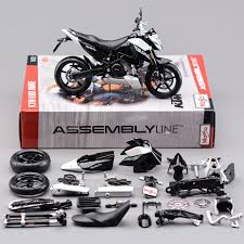 Enjoys the juxtaposition of americana in royal britannia. Click To Buy Maisto 1 12 Model Motorcycle Toy Simulation Diecast Metal Ktm 690 Duke Motor Diy Car A Motorcycle Model Model Building Kits Model Building