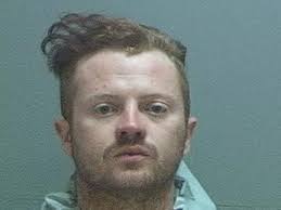 Salt Lake man charged with burning police car in riot to remain in jail