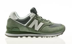 It features a durable synthetic upper atop a comfortable midsole and heel for a fresh look and feel. New Balance Wl574 779401 50 6 Green Orange Jungle