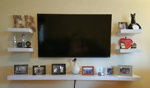 18 Chic And Modern Tv Wall Mount Ideas For Living Room Wall Mounted Tv Decor Mounted Tv Decor Floating Shelves Living Room
