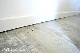 Diy Baseboard Tutorial H2obungalow In 2020 Baseboards Flooring Baseboard Trim